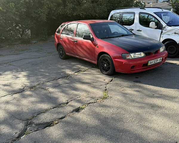 Красный Ниссан Альмера, объемом двигателя 1.4 л и пробегом 293 тыс. км за 1400 $, фото 1 на Automoto.ua
