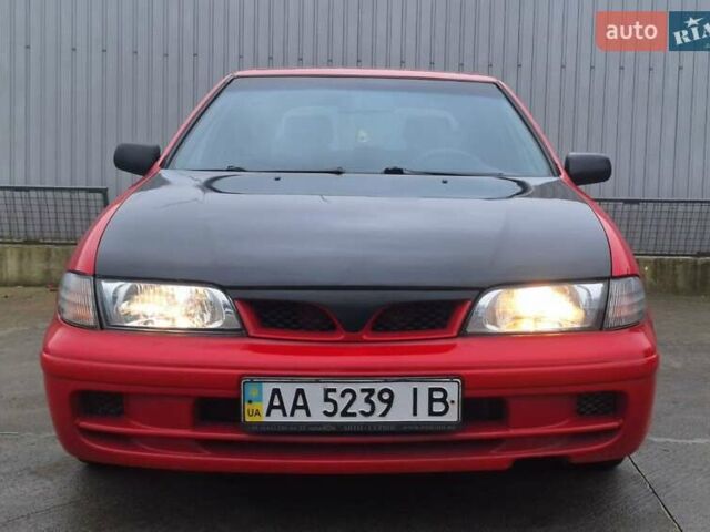 Красный Ниссан Альмера, объемом двигателя 1.39 л и пробегом 29 тыс. км за 2250 $, фото 1 на Automoto.ua