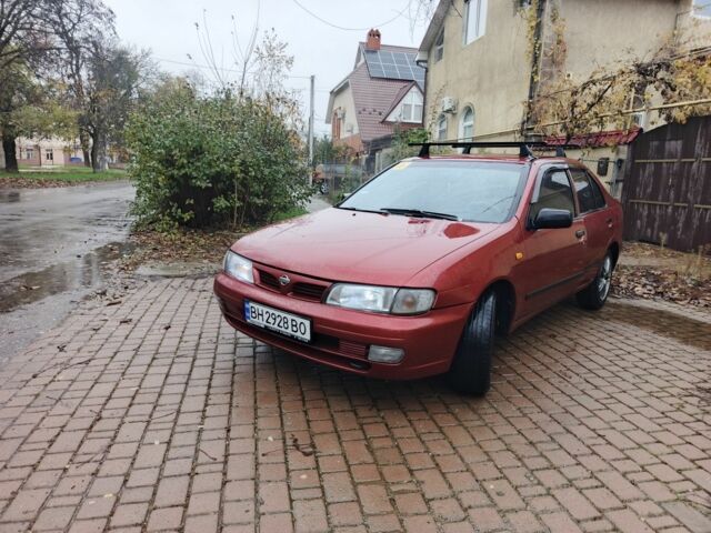 Червоний Ніссан Альмера, об'ємом двигуна 1.4 л та пробігом 3 тис. км за 1900 $, фото 1 на Automoto.ua