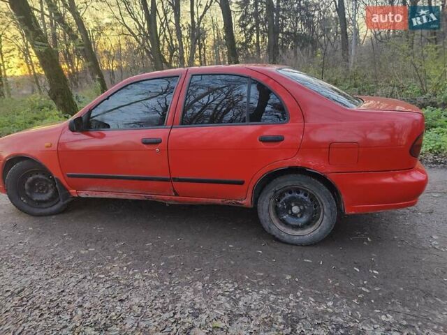 Красный Ниссан Альмера, объемом двигателя 1.4 л и пробегом 370 тыс. км за 900 $, фото 1 на Automoto.ua