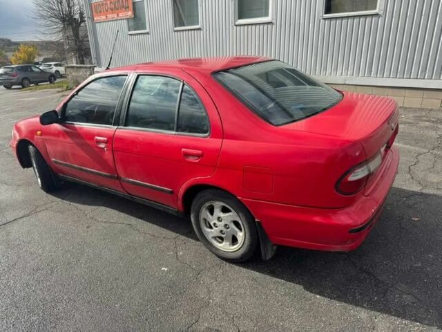 Червоний Ніссан Альмера, об'ємом двигуна 1.4 л та пробігом 250 тис. км за 1500 $, фото 1 на Automoto.ua