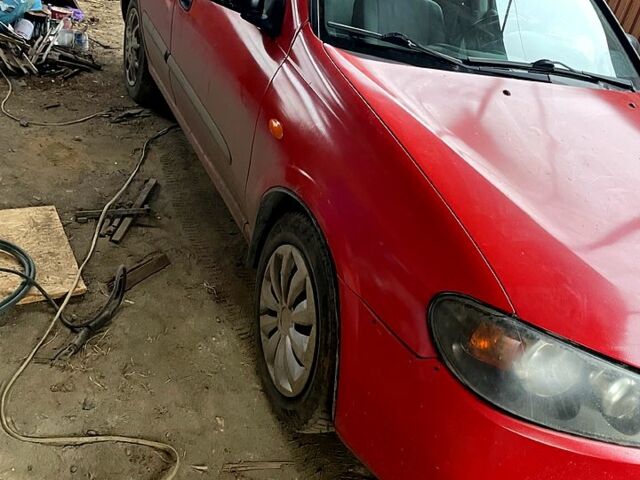Красный Ниссан Альмера, объемом двигателя 1.5 л и пробегом 250 тыс. км за 1650 $, фото 1 на Automoto.ua