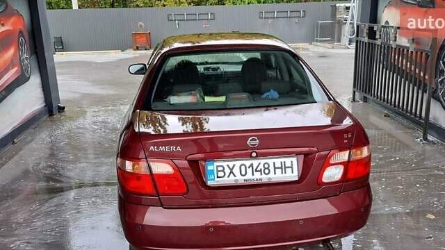 Красный Ниссан Альмера, объемом двигателя 1.5 л и пробегом 231 тыс. км за 3100 $, фото 1 на Automoto.ua