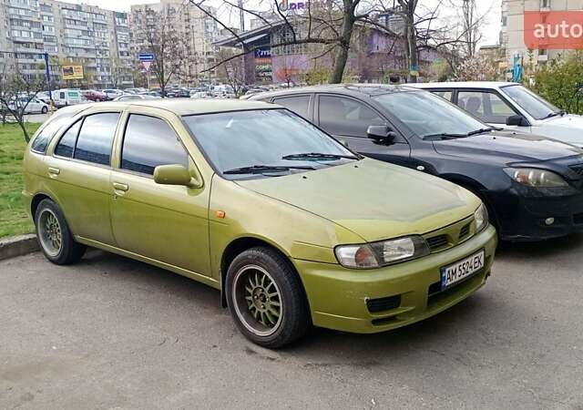 Жовтий Ніссан Альмера, об'ємом двигуна 1.4 л та пробігом 140 тис. км за 1800 $, фото 1 на Automoto.ua