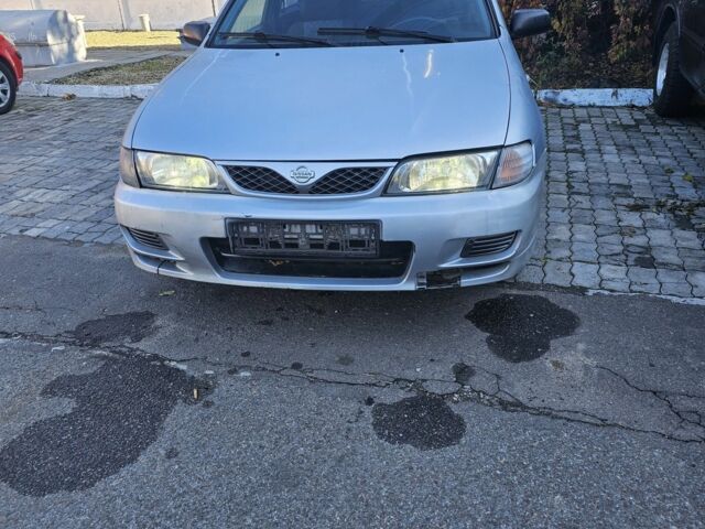Серый Ниссан Альмера, объемом двигателя 1.6 л и пробегом 320 тыс. км за 650 $, фото 1 на Automoto.ua