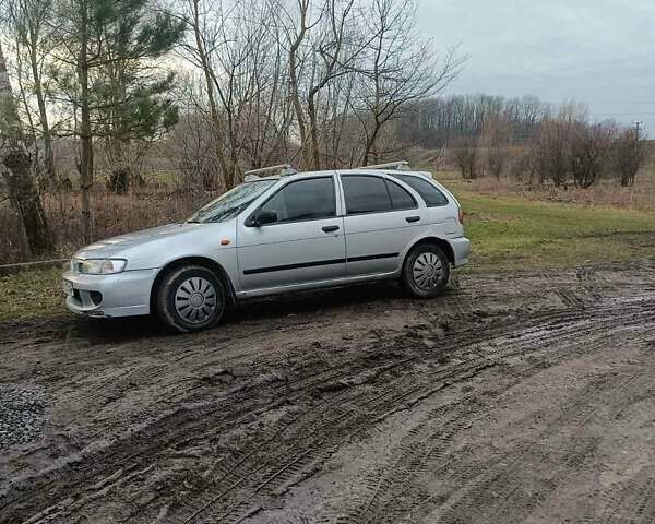 Сірий Ніссан Альмера, об'ємом двигуна 1.39 л та пробігом 300 тис. км за 1400 $, фото 1 на Automoto.ua