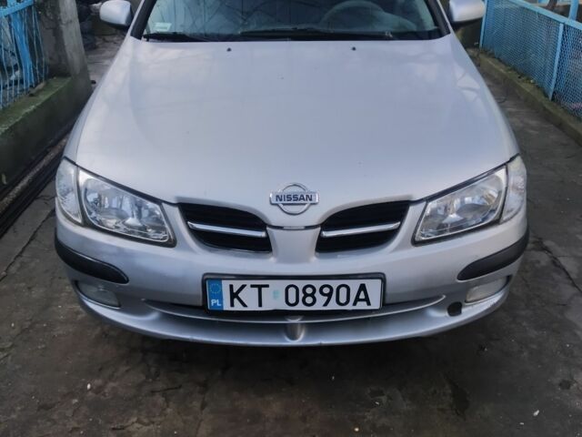 Серый Ниссан Альмера, объемом двигателя 1.5 л и пробегом 240 тыс. км за 900 $, фото 1 на Automoto.ua