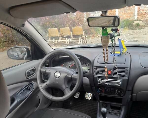 Сірий Ніссан Альмера, об'ємом двигуна 2.18 л та пробігом 300 тис. км за 3500 $, фото 1 на Automoto.ua