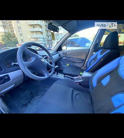 Серый Ниссан Альмера, объемом двигателя 1.8 л и пробегом 0 тыс. км за 2400 $, фото 1 на Automoto.ua