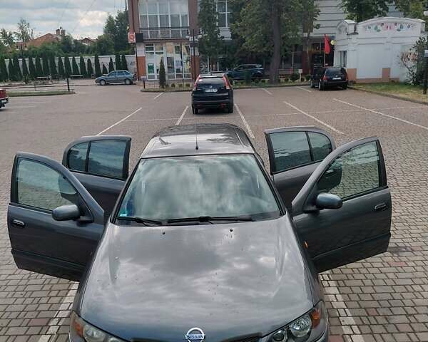 Серый Ниссан Альмера, объемом двигателя 1.5 л и пробегом 190 тыс. км за 4400 $, фото 1 на Automoto.ua