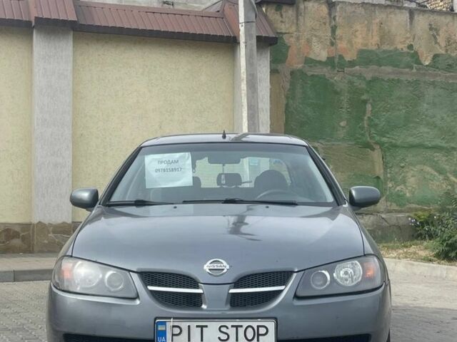 Серый Ниссан Альмера, объемом двигателя 1.5 л и пробегом 300 тыс. км за 3700 $, фото 1 на Automoto.ua