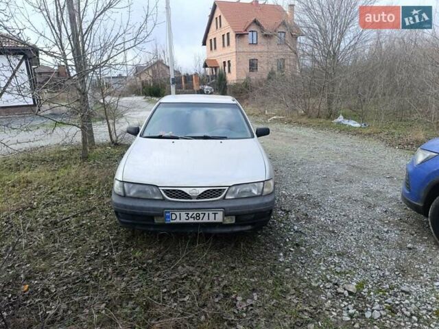 Серый Ниссан Альмера, объемом двигателя 1.4 л и пробегом 228 тыс. км за 3000 $, фото 1 на Automoto.ua