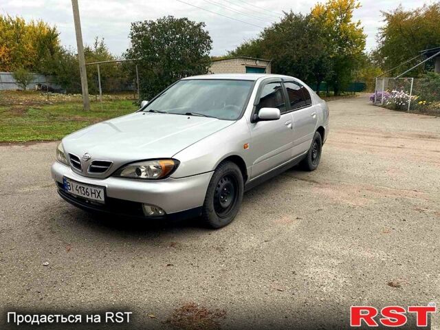 Серый Ниссан Альмера, объемом двигателя 2 л и пробегом 205 тыс. км за 2290 $, фото 1 на Automoto.ua