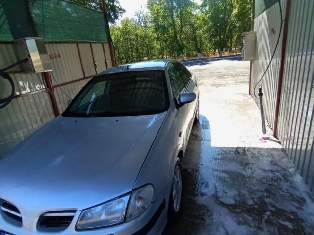 Сірий Ніссан Альмера, об'ємом двигуна 1.8 л та пробігом 250 тис. км за 2099 $, фото 1 на Automoto.ua
