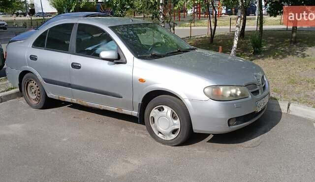Серый Ниссан Альмера, объемом двигателя 1.5 л и пробегом 380 тыс. км за 2100 $, фото 1 на Automoto.ua