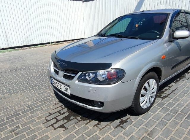 Серый Ниссан Альмера, объемом двигателя 1.5 л и пробегом 330 тыс. км за 3300 $, фото 1 на Automoto.ua