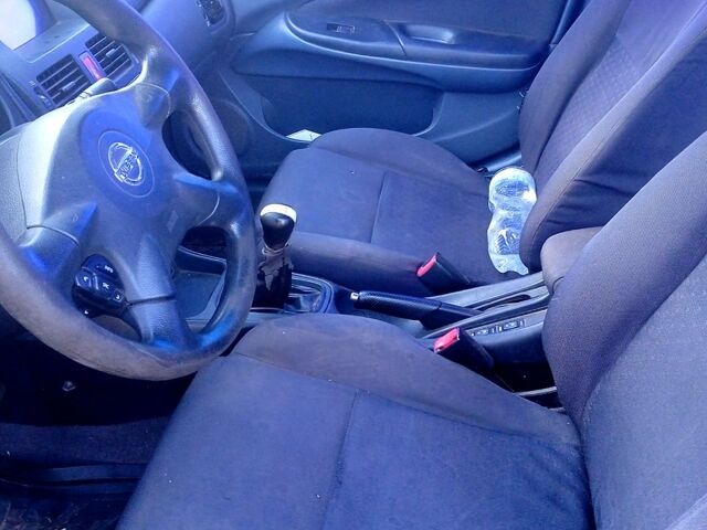 Серый Ниссан Альмера, объемом двигателя 1.5 л и пробегом 296 тыс. км за 2600 $, фото 1 на Automoto.ua