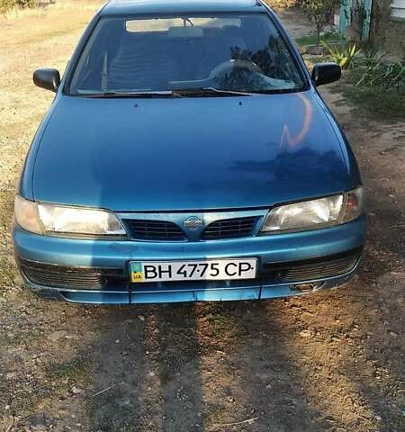 Синій Ніссан Альмера, об'ємом двигуна 1.4 л та пробігом 300 тис. км за 1500 $, фото 1 на Automoto.ua