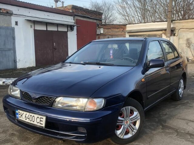 Синий Ниссан Альмера, объемом двигателя 1.4 л и пробегом 295 тыс. км за 2550 $, фото 1 на Automoto.ua