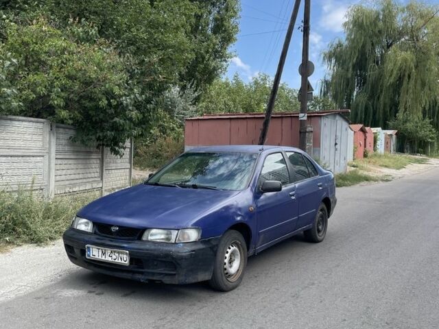 Синий Ниссан Альмера, объемом двигателя 2 л и пробегом 333 тыс. км за 800 $, фото 1 на Automoto.ua