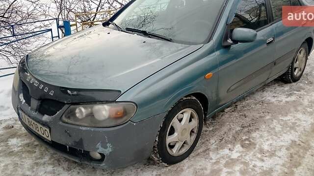 Синий Ниссан Альмера, объемом двигателя 1.5 л и пробегом 280 тыс. км за 1500 $, фото 1 на Automoto.ua