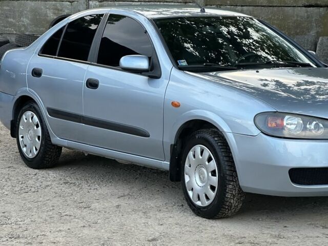 Синий Ниссан Альмера, объемом двигателя 1.5 л и пробегом 230 тыс. км за 3450 $, фото 1 на Automoto.ua
