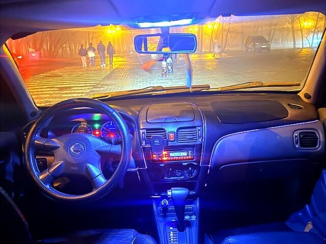 Синій Ніссан Альмера, об'ємом двигуна 1.8 л та пробігом 20000 тис. км за 3500 $, фото 1 на Automoto.ua