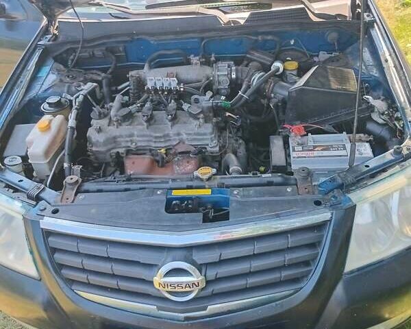 Синий Ниссан Альмера, объемом двигателя 1.6 л и пробегом 310 тыс. км за 3300 $, фото 1 на Automoto.ua