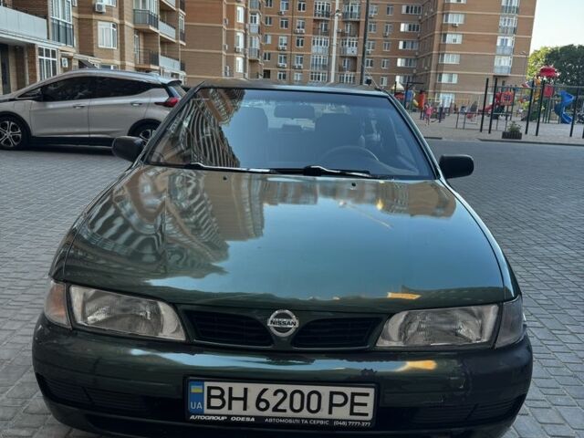Зелений Ніссан Альмера, об'ємом двигуна 1.4 л та пробігом 227 тис. км за 2000 $, фото 1 на Automoto.ua