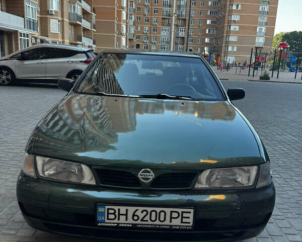 Зеленый Ниссан Альмера, объемом двигателя 1.39 л и пробегом 227 тыс. км за 1900 $, фото 1 на Automoto.ua
