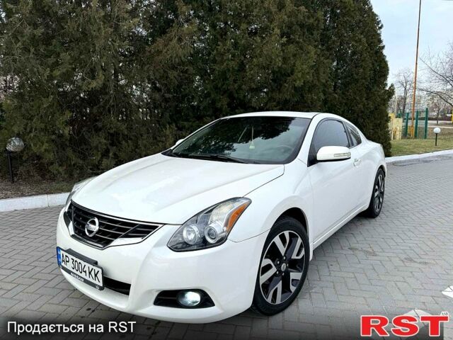 Белый Ниссан Альтима, объемом двигателя 2.5 л и пробегом 167 тыс. км за 8500 $, фото 1 на Automoto.ua