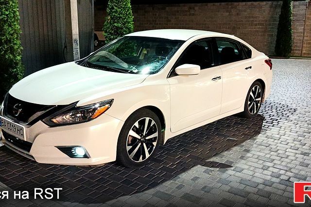 Білий Ніссан Альтіма, об'ємом двигуна 2.5 л та пробігом 85 тис. км за 14000 $, фото 1 на Automoto.ua