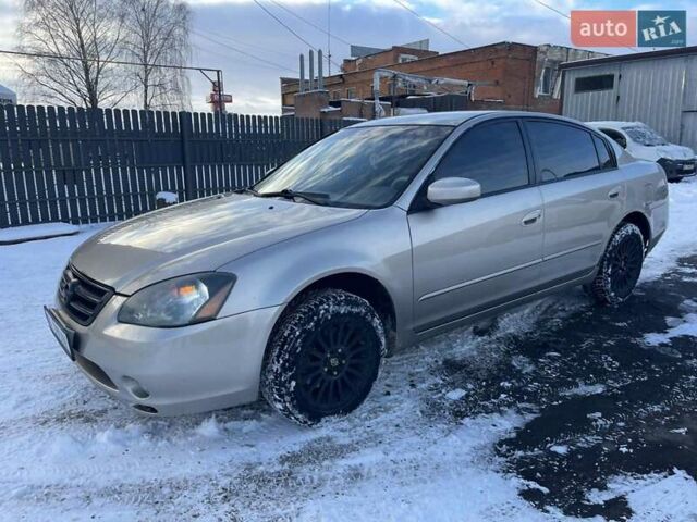 Бежевий Ніссан Альтіма, об'ємом двигуна 2.49 л та пробігом 247 тис. км за 2999 $, фото 1 на Automoto.ua