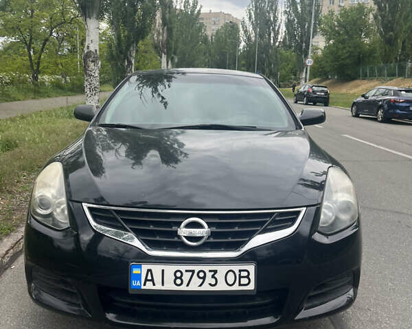 Черный Ниссан Альтима, объемом двигателя 2.5 л и пробегом 285 тыс. км за 7200 $, фото 1 на Automoto.ua