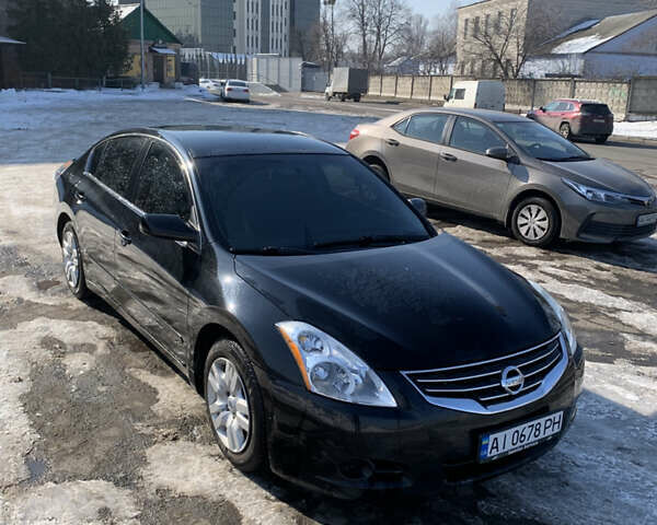 Черный Ниссан Альтима, объемом двигателя 2.49 л и пробегом 222 тыс. км за 5499 $, фото 1 на Automoto.ua