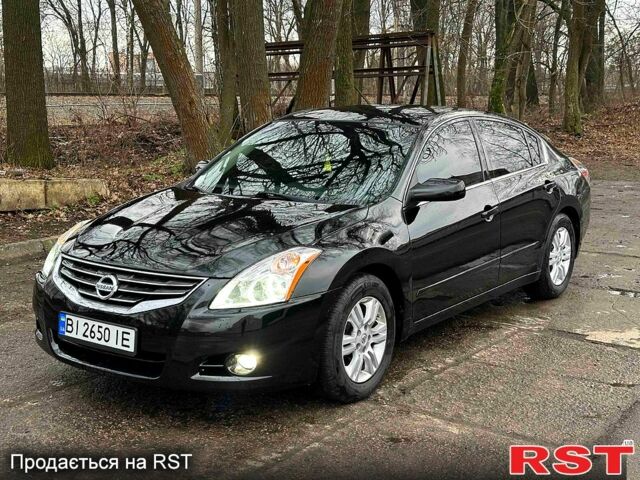 Чорний Ніссан Альтіма, об'ємом двигуна 2.5 л та пробігом 180 тис. км за 5900 $, фото 1 на Automoto.ua