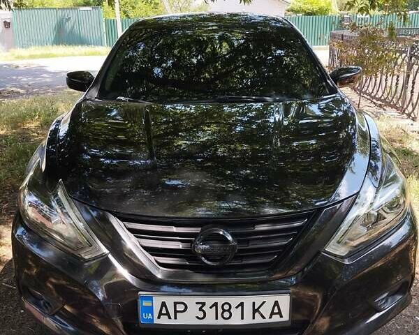 Черный Ниссан Альтима, объемом двигателя 2.49 л и пробегом 175 тыс. км за 11000 $, фото 1 на Automoto.ua