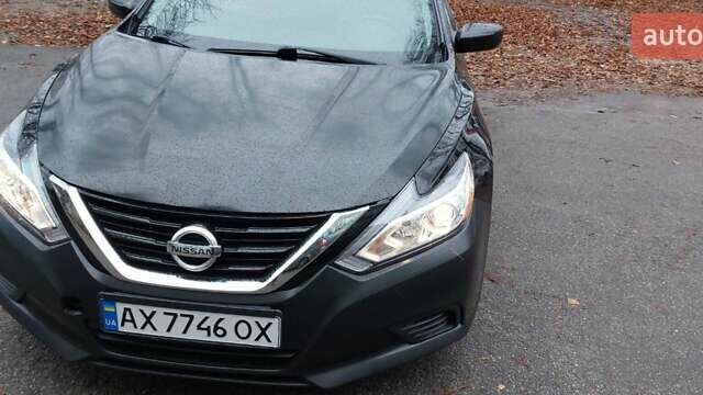 Черный Ниссан Альтима, объемом двигателя 2.49 л и пробегом 142 тыс. км за 10500 $, фото 1 на Automoto.ua