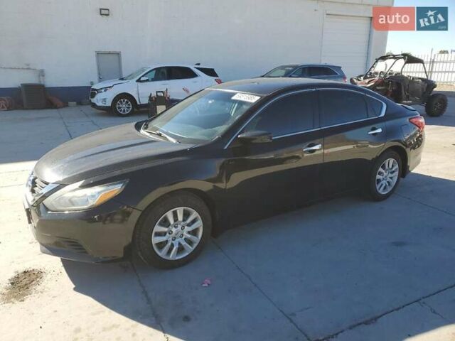 Черный Ниссан Альтима, объемом двигателя 2.49 л и пробегом 129 тыс. км за 1300 $, фото 1 на Automoto.ua