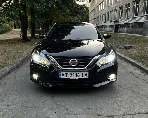Черный Ниссан Альтима, объемом двигателя 2.49 л и пробегом 139 тыс. км за 11850 $, фото 1 на Automoto.ua