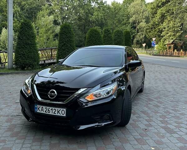 Черный Ниссан Альтима, объемом двигателя 2.49 л и пробегом 145 тыс. км за 12500 $, фото 1 на Automoto.ua