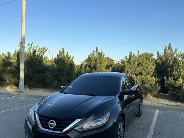 Черный Ниссан Альтима, объемом двигателя 2.5 л и пробегом 163 тыс. км за 9100 $, фото 1 на Automoto.ua