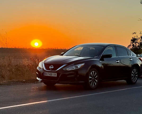 Черный Ниссан Альтима, объемом двигателя 2.49 л и пробегом 200 тыс. км за 10500 $, фото 1 на Automoto.ua