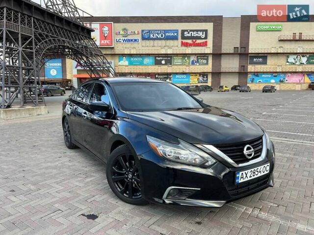 Черный Ниссан Альтима, объемом двигателя 2.49 л и пробегом 180 тыс. км за 11800 $, фото 1 на Automoto.ua