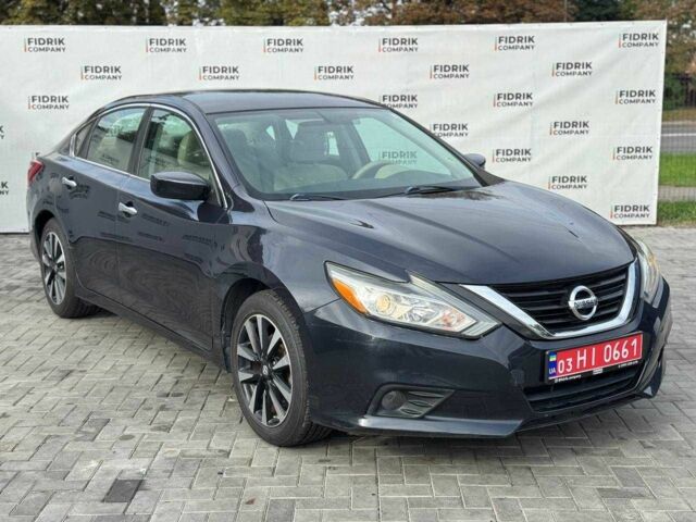 Черный Ниссан Альтима, объемом двигателя 2.5 л и пробегом 175 тыс. км за 8000 $, фото 1 на Automoto.ua