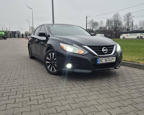 Черный Ниссан Альтима, объемом двигателя 2.49 л и пробегом 224 тыс. км за 11500 $, фото 1 на Automoto.ua