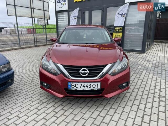 Красный Ниссан Альтима, объемом двигателя 2.49 л и пробегом 170 тыс. км за 8800 $, фото 1 на Automoto.ua