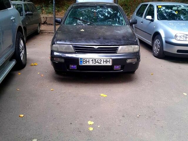 Сірий Ніссан Альтіма, об'ємом двигуна 2.4 л та пробігом 240 тис. км за 1100 $, фото 1 на Automoto.ua