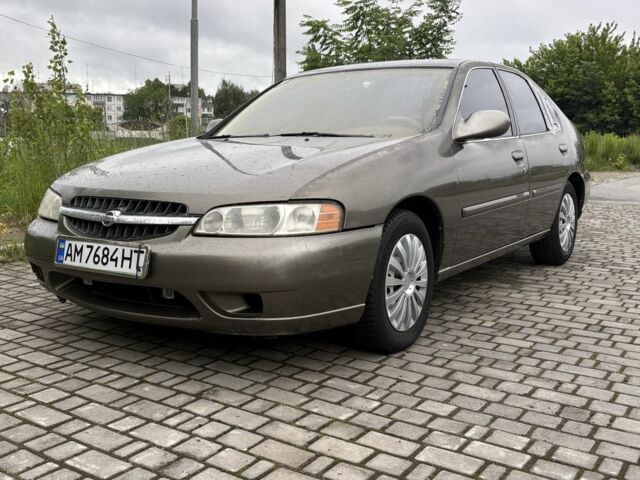 Сірий Ніссан Альтіма, об'ємом двигуна 2.4 л та пробігом 240 тис. км за 1751 $, фото 1 на Automoto.ua