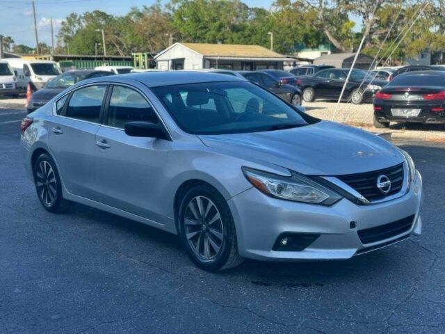 Серый Ниссан Альтима, объемом двигателя 2.5 л и пробегом 67 тыс. км за 1850 $, фото 1 на Automoto.ua